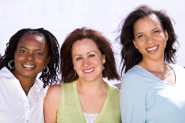 Diverse group of people talking and laughing.
