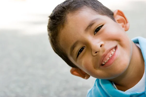 Head and shoulders portrait of a Hispanic boy. — Stock Photo, Image