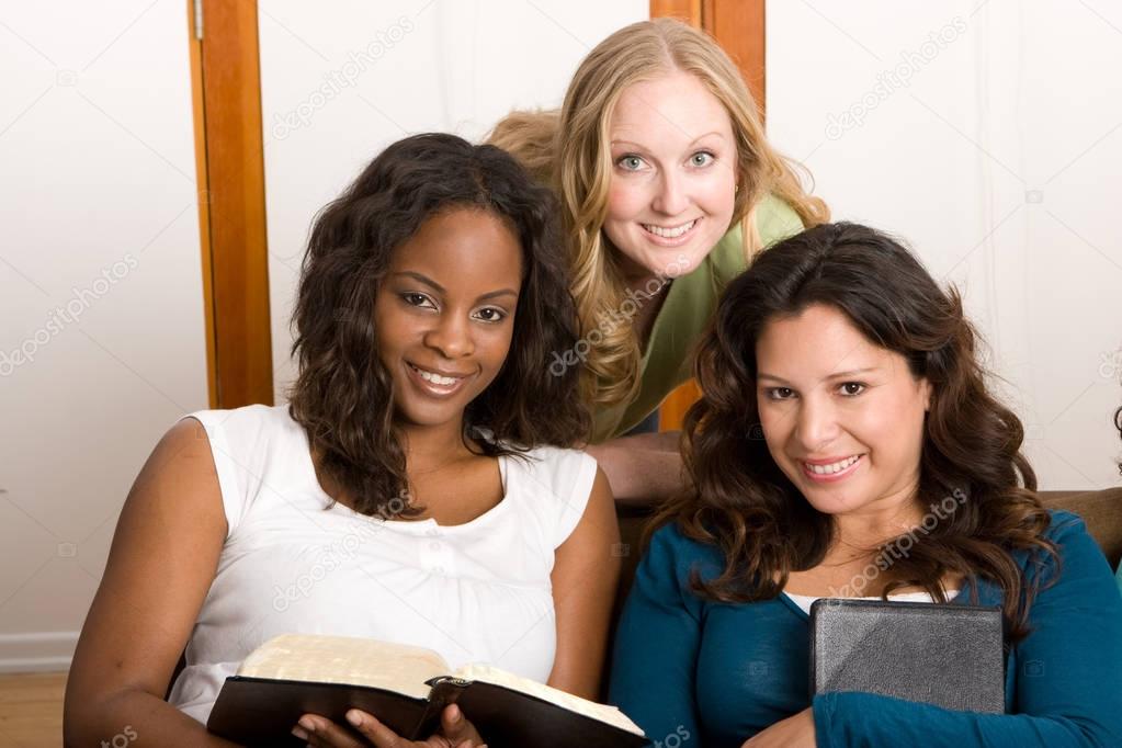 Diverse group of women studing together.