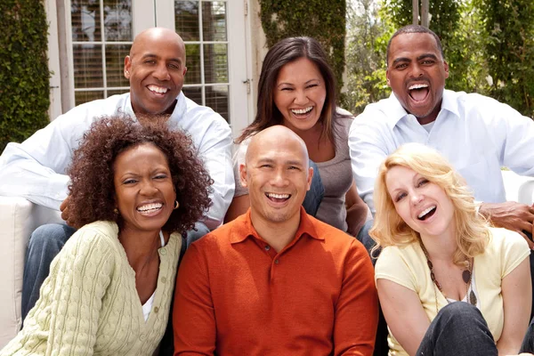 Multi ethnic group of people smiling outside. — Stock Photo, Image