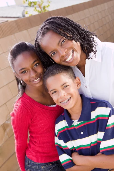 Happy African American mother and her children. — Stock Photo, Image