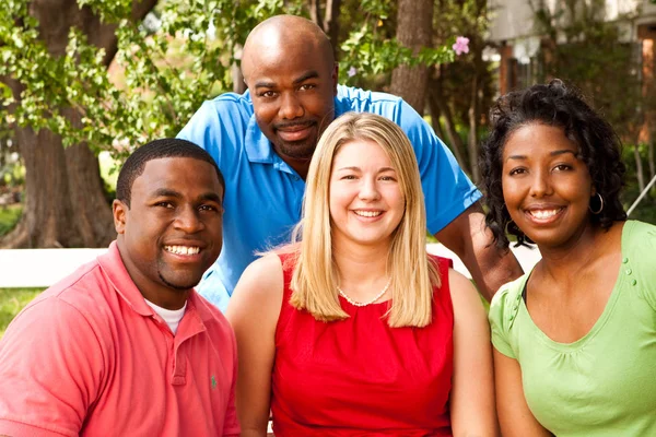 Diverse group of people talking and laughing. — Stock Photo, Image