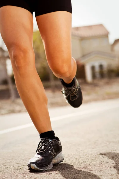 Asian woman running and exercising outside — Stock Photo, Image