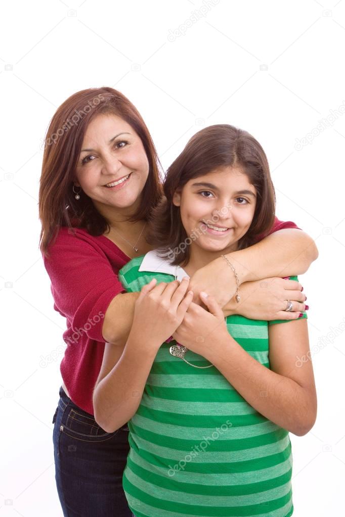 Happy Hispanic mother and daughter.