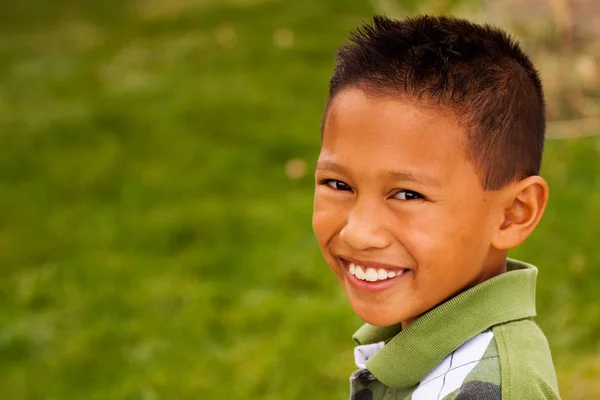 Happy young Asian kid smiling and laughing. — Stock Photo, Image