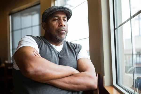 Portrait of a mature African American man in deep thought. — Stock Photo, Image