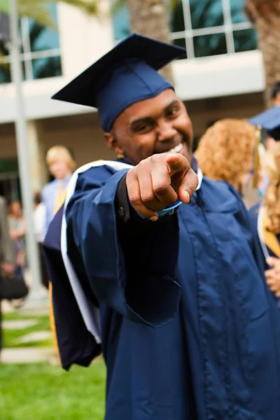 African American man pointing at the camera at his graduation. — Stock Photo, Image