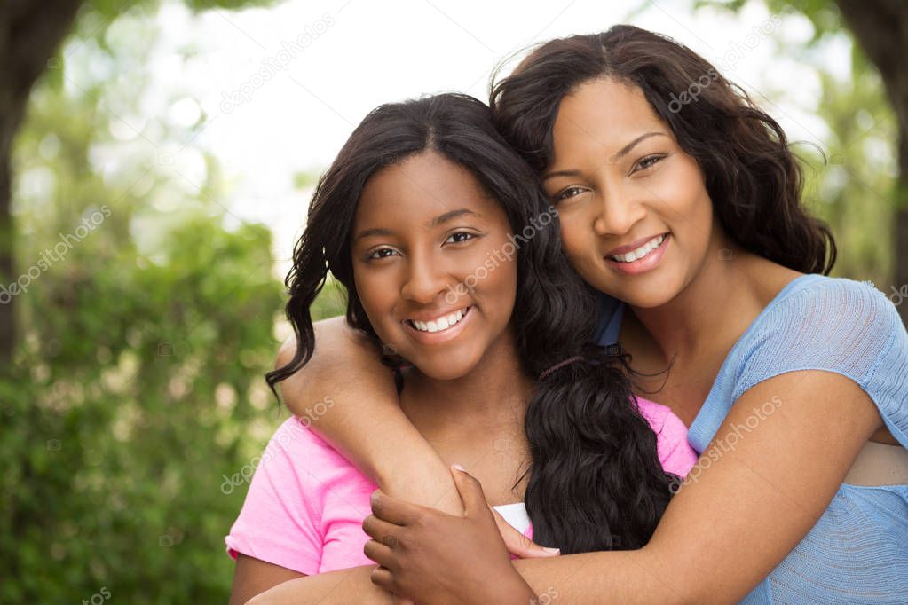 African American mother and her daugher.