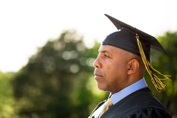 Middle age man graduating — Stock Photo, Image