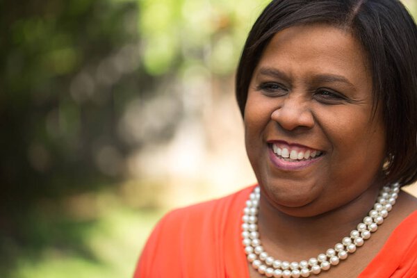 Mature woman smiling.