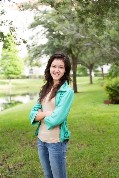 Young teen girl smiling outside. — Stock Photo, Image