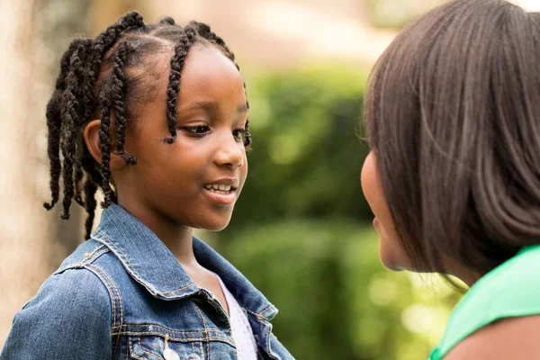 Happy African American mother and daughter. — Stock Photo, Image