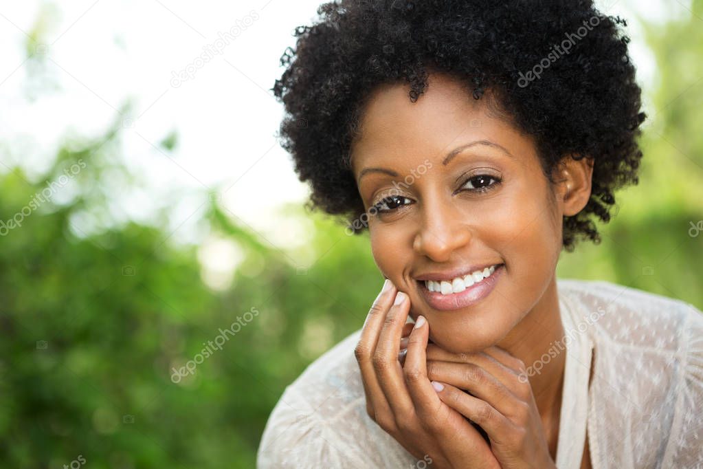 Beautiful woman smiling outside.