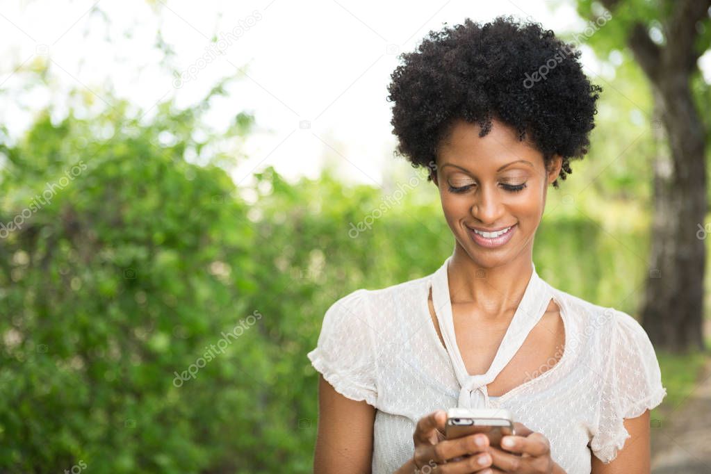 Beautiful woman smiling outside.