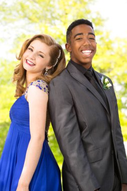 Young teens getting ready for the prom. clipart