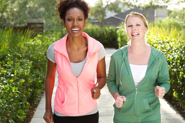 Friends talking and exercising.