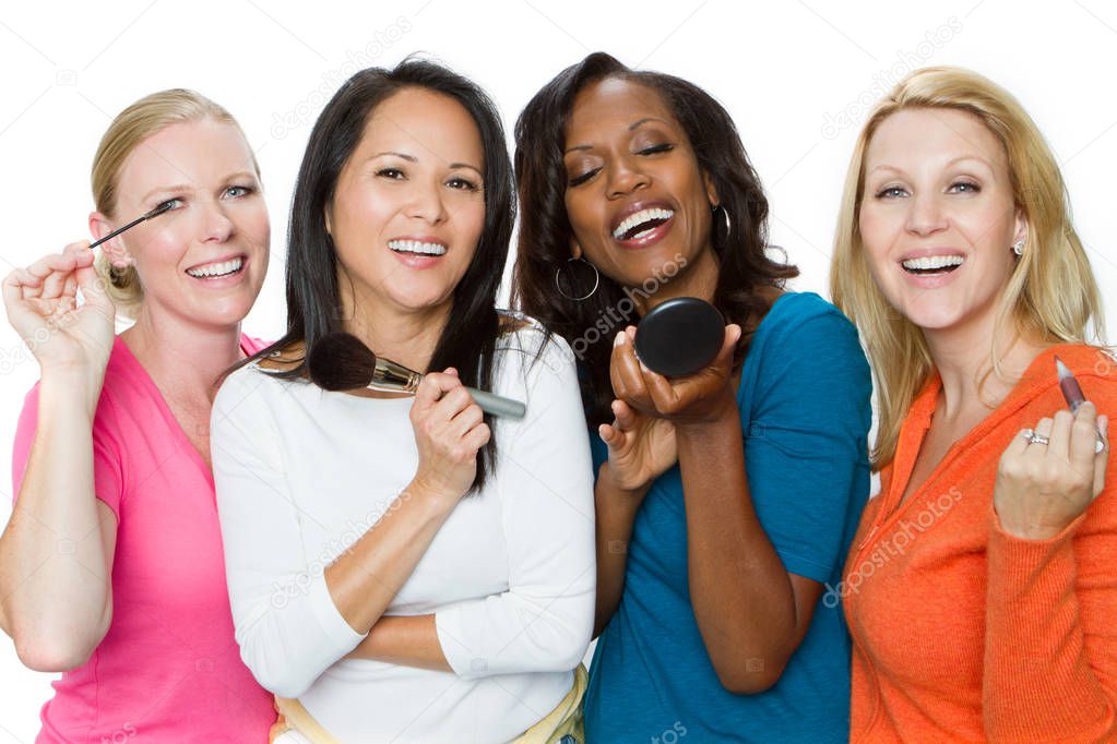 Diverse group of women applying makeup.