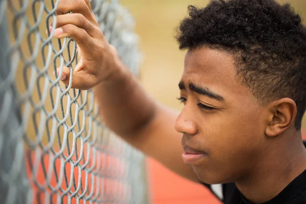 Young teenage boy in deep thought. — Stock Photo, Image