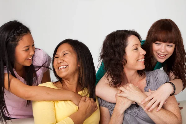 Diverse group of mothers and daughters. — Stock Photo, Image
