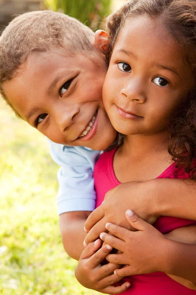 Mixed race brother and sister. — Stock Photo, Image