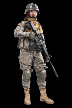 Kadın ABD Ordusu asker tüfeği ile.