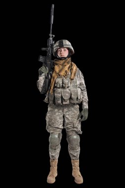 Kadın ABD Ordusu asker tüfeği ile.