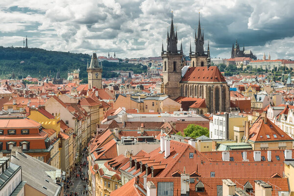 PRAGUE, CZECH REPUBLIC - JULY 31, 2016: View of Prague Old Town from the Powder Tower, St. Vitus Cathedral and church of our lady before tyn on background
