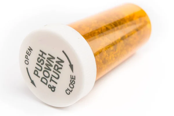 Nahaufnahme Von Medizinischem Marihuana Einer Gelben Tablettenflasche Auf Weißem Hintergrund — Stockfoto