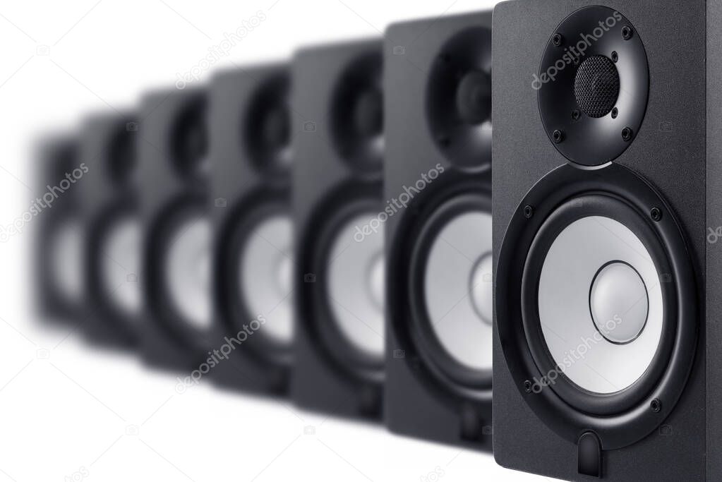 A lot of speakers on a white background. Shot in studio. Isolated with clipping path.