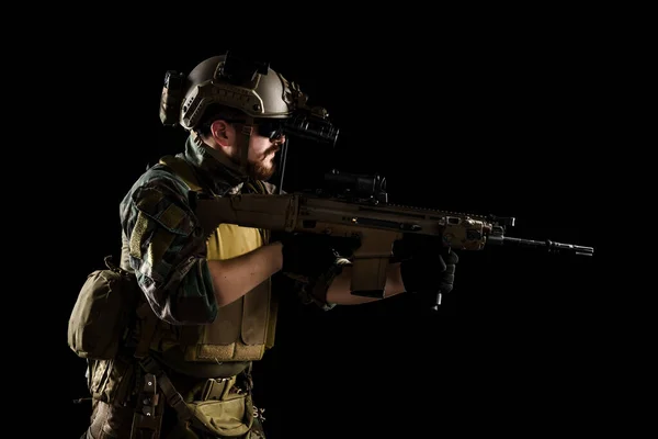 US marine corps soldier with rifle. shot in studio. isolated with clipping on white background