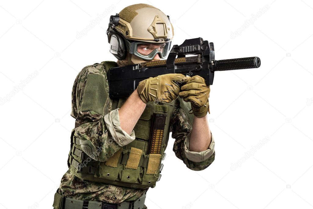 Male in uniform of Tactical Units of Police with submachine gun P90. Shot in studio. Isolated with clipping path on white background