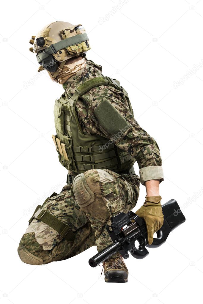 Male in uniform of Tactical Units of Police with submachine gun P90. Shot in studio. Isolated with clipping path on white background
