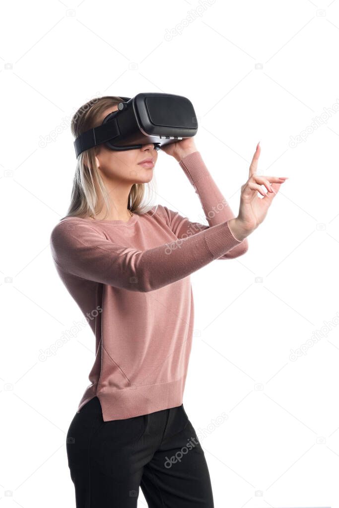 Young woman in virtual reality (VR) glasses. Isolated on white background