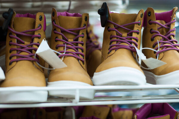 Brown all-weather women's shoes in the store.