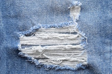 Yıkama RIP ile mavi kot pantolon. Denim arka plan doku. Yırtık d