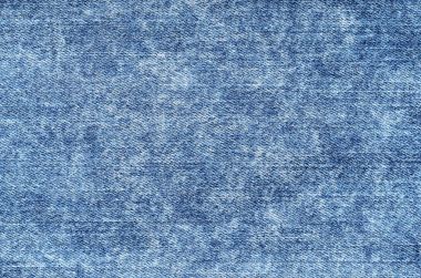 Asit yıkama mavi kot pantolon. Denim arka plan, doku, yakın çekim. SK