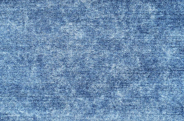 Džíny v kyselině umýt modré. Džínovina pozadí, textura, zblízka. FA — Stock fotografie