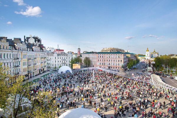 Kiev, Ukraine. Crowd and Easter painted eggs Festival on Sofievska square and St Michael's Monastery