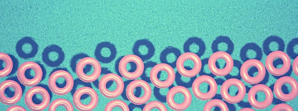 Colorful swim ring isolated in swimming pool. 3d rendering — Stock Photo, Image