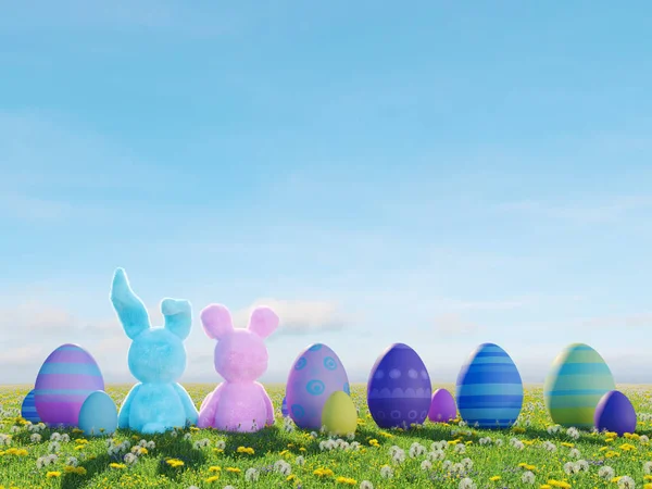 Two easter rabbits sitting in lawn with easter eggs. 3d rendering — Stock Photo, Image