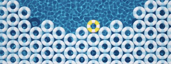Unik gul float ring mellan blå float ringar i poolen. 3D-rendering — Stockfoto