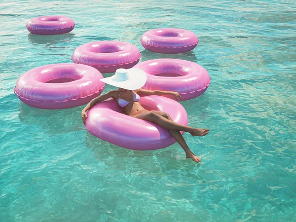 Vrouw op float in een zwembad zwemmen. 3D-rendering — Stockfoto