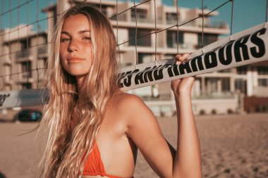 girl standing on the beach. golden hour. california lifestyle