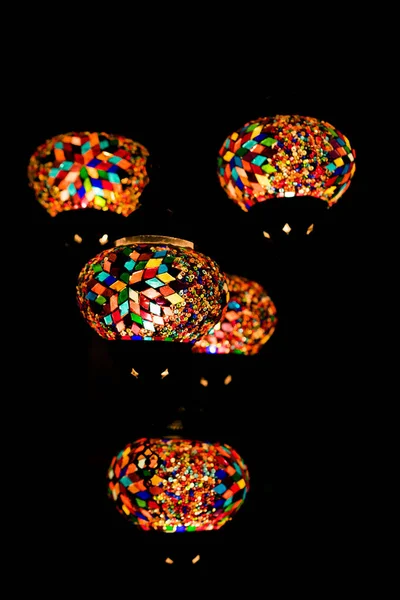 Turkish lanterns from small multi colored piece of glass hanging in the dark — Stockfoto