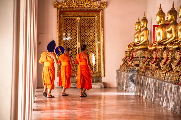 Bangkok, Thailand - May, 19, 2013 : Buddhist monks walking among