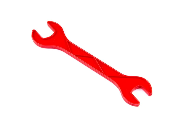 Children's toy tool plastic color wrench isolated on white backg — Stock fotografie