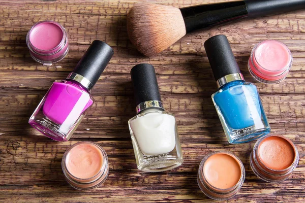 Group of bright nail polishes, lipstick, lipstick balm and brush — Φωτογραφία Αρχείου