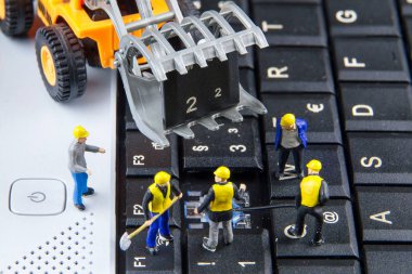 Klavye bilgisayar dizüstü tamir mühendislerden oluşan küçük oyuncaklar ekip. C