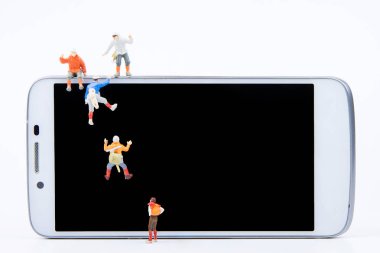 Minyatür küçük oyuncaklar ekibi sma kenarında tırmanma tırmanıcı