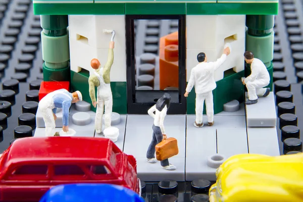 Miniature tiny toys team painter were painting new stores. — Stock Photo, Image